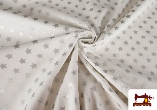 Comprar online Tela de Algodón de Estrellas Plateadas