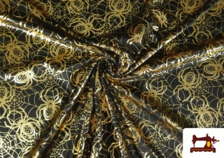 Comprar online Lamé estampado Arañas Doradas Halloween
