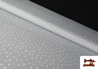 Comprar online Tela de Algodón Estrellas Pequeñas de Colores color Gris